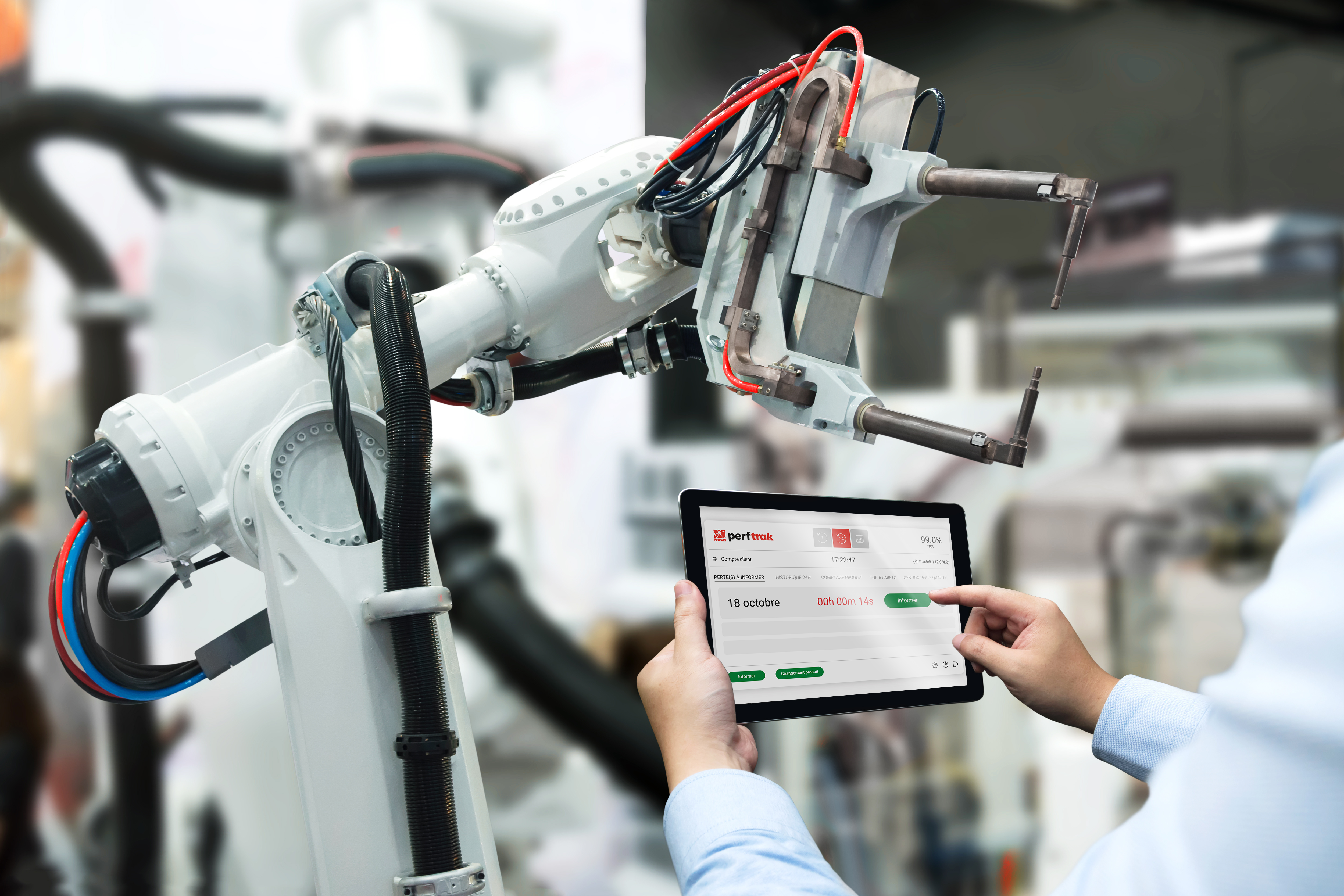 Engineer hand using tablet, heavy automation robot arm machine i